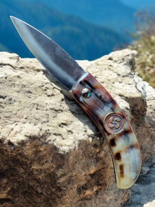 Cuchillo de pastor vasco cuerno cabeza de oveja negro